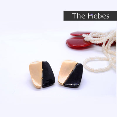 Golden and black square shape studs